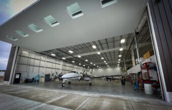 Partition to be used in an aircraft hangar with small aircraft in view